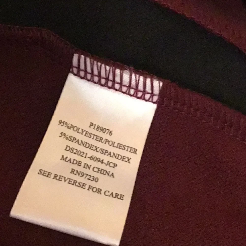 Short sleeved dress in 2 tone burgundy & black in small by ALMOST FAMOUS